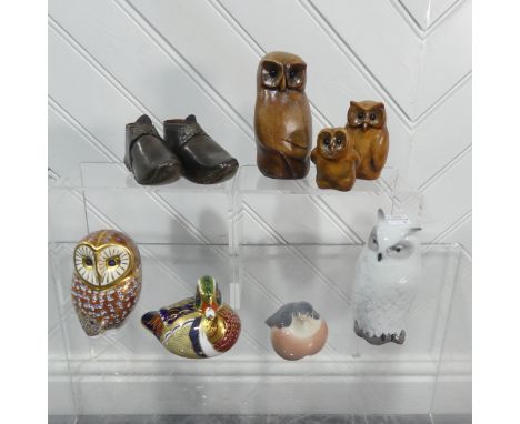 Royal Crown Derby: a Barn Owl paperweight, and a Carolina Duck paperweight, both with gold stoppers, together with a Royal Co