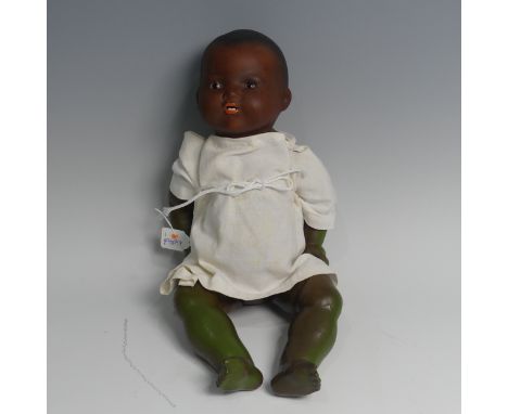 An early 20th century Armand Marseille bisque head black Baby Doll, impressed no.351./4.K., with moulded hair, sleeping brown