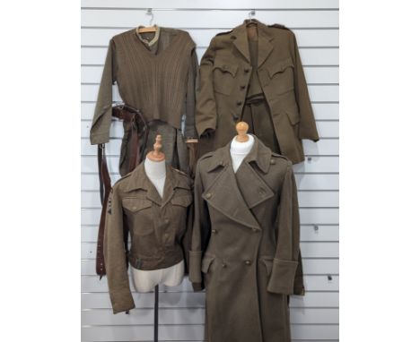 A small collection of WW2 and later British Army Uniforms, including; A WW2 1940 Pattern Battledress by Cohen &amp; Wilks wit