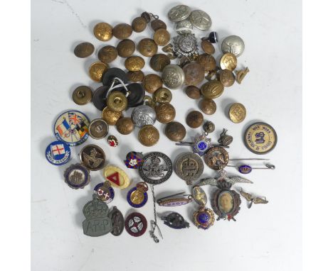 A collection of twenty-six various pin/lapel badges, including some military, silver Royal Army Service Corps sweetheart badg