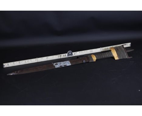 Antique Somali Billao Short Sword   This antique Somali Billao short sword measures approximately 23 inches in length. The bl