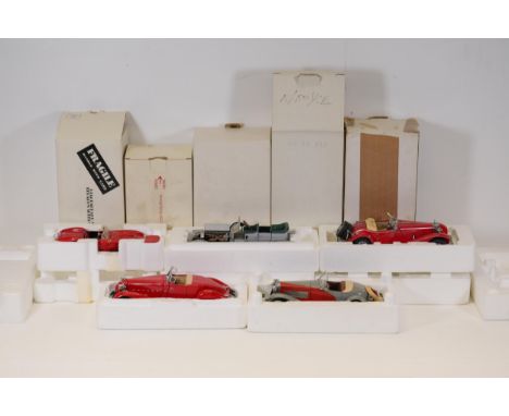 Ferrari Model Racing Car and Other Collectible Vehicles  The collection features a Ferrari model racing car alongside additio