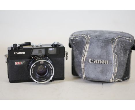**Vintage Canon Canonet G-III QL 35mm Rangefinder Camera with 40mm f/1.7 Lens  This listing features a vintage Canon Canonet 