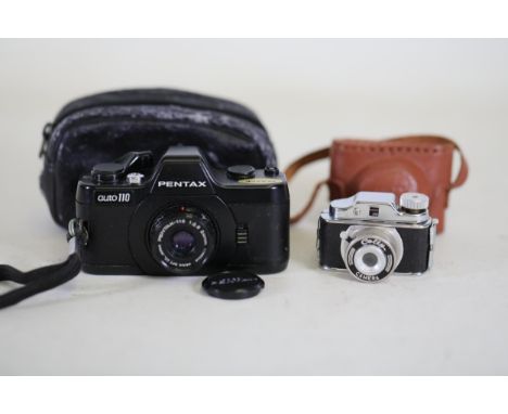 **Pentax Auto 110 and Collie Camera with Cases**  The Pentax Auto 110 and Collie Camera presented here are a fine addition to