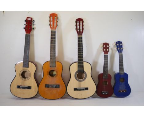 **Collection of Three Acoustic Guitars and Two Brightly Coloured Ukuleles**  This collection showcases a diverse array of str