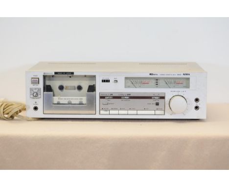 **Item Description: AIWA Stereo Cassette Deck AD-M450K**  This AIWA Stereo Cassette Deck, model AD-M450K, is a vintage audio 