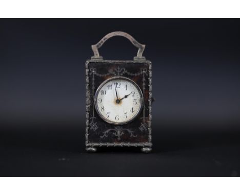 Tortoiseshell Miniature Carriage Clock by William Comyns &amp; Sons Ltd, 1910 This vintage miniature carriage clock features 
