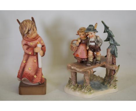 **Porcelain Figurines: Young Angel Figure 'Heavenly Angel' and Goebel Hummel 'On Our Way' Bavarian Children** This lot featur