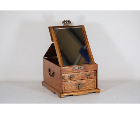 Early 19th Century Southern Chinese Handmade Hardwood Jewellery Case with Pop-Up Mirror An early 19th-century handmade hardwo