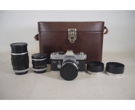 Canon Ft Ql Camera and 3 canon camera lenses plus rox camera case  Lenses included in this lot are as follows   Canon lens fl