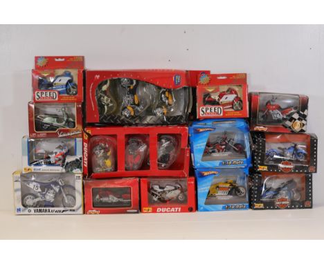 Collection of Boxed Model Motorcycles and Scooters  This comprehensive collection features a variety of meticulously detailed