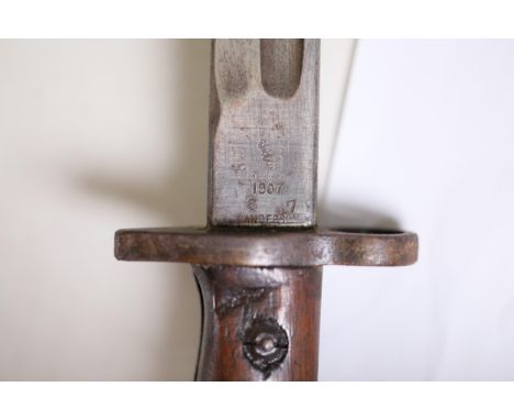 British 1907 Bayonet by Sanderson with Scabbard  This exemplary British 1907 bayonet, manufactured by Sanderson, epitomises t