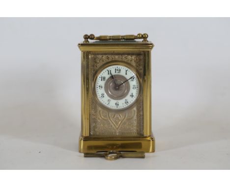 French Carriage Clock by Couaillet Freres, c1900, Engraved Design This is a c1900 French carriage clock made by Couaillet Fre