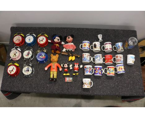 Large Collection of Items Relating to Disney, including 8 vintage alarm clocks, cups, and some toys, as well as a Minnie Mous