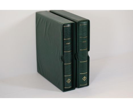 Two Green Leather-Covered Stamp Albums with "JERSEY" Gold Embossed Spines  This exquisite pair of green leather-covered album