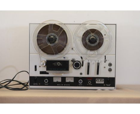 AKAI 40000 Reel-to-Reel Tape Recorders  Vintage AKAI 40000 reel-to-reel tape recorder, hails from the mid-20th century, renow