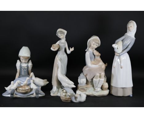 **Collection of Four Lladró Porcelain Figurines**  This exquisite collection features four beautifully crafted Lladró porcela