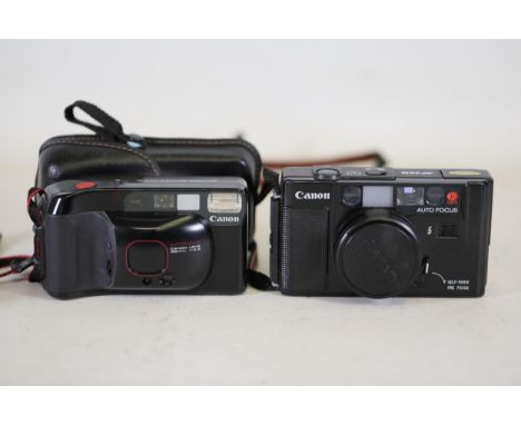 Canon sure shot supreme and canon auto focus AF35M  This lot includes two Canon autofocus 35mm film cameras, accompanied by a