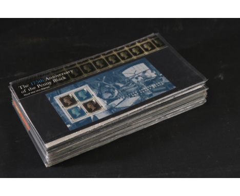**Collection of Royal Mail Presentation Packs Featuring Historical and Thematic Stamps**  This comprehensive collection compr