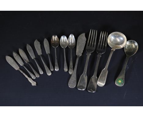 14-Piece Silver Cutlery Set  This exquisite collection includes 14 polished silver cutlery items. On the left, there are six 