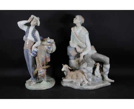**Lladró Porcelain Figurines: Typical Peddler and Shepherd Resting**  This exquisite set of Lladró porcelain figurines includ