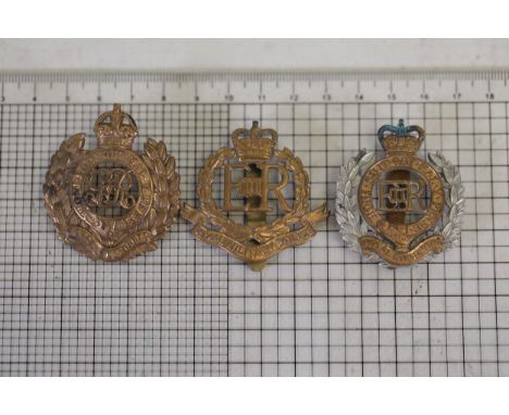 **Collection of British Military Cap Badges   This collection includes three British military cap badges, each meticulously c
