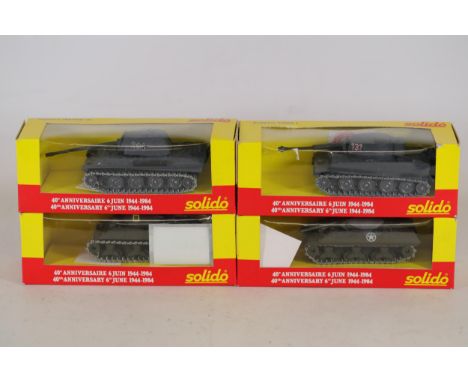 Four boxed Solido military vehicles in new condition. Models included are the Sherman M4 A3, PzKpfw Tiger 1, Destroyer M 10, 