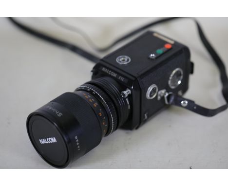 **Nalcom FTL Synchro Zoom Movie Camera with Sinkor Zoom Lens**  This classic Nalcom FTL Synchro Zoom movie camera is equipped