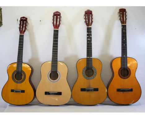 **Collection of Four Distinctive Acoustic Guitars from Various Noted Brands**  This collection features four distinct acousti