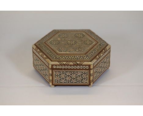 Hexagonal Marquetry Box with Intricate Geometric Inlays  This exquisite hexagonal marquetry box showcases an elegant combinat