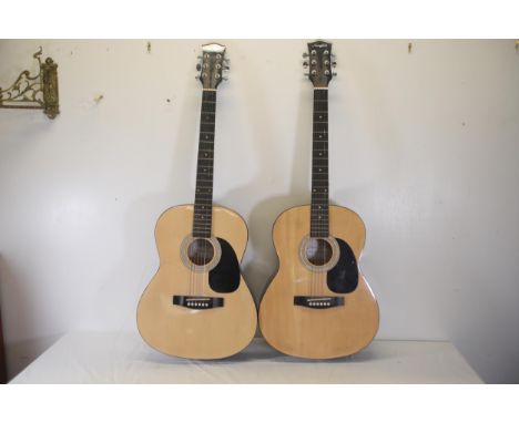 Pair of Martin Smith Acoustic Guitars W-100N-PK  These two acoustic guitars feature a classic design with natural wood finish