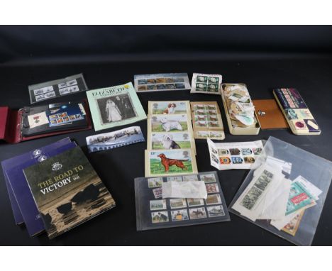 **Comprehensive Postage Stamp Collection Featuring Presentation Packs, Albums, Ephemera, and Thematic Sheets**  This collecti