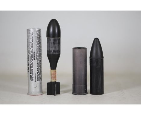 **Collection of Inert Riot Control and Training Projectiles**  This collection features two distinct inert projectiles used f
