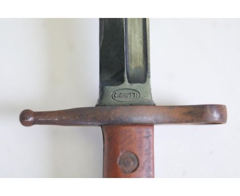 Italian Carcano M1891 Bayonet by C. Gnutti with Scabbard  This Italian Carcano M1891 bayonet features a remarkable craftsmans