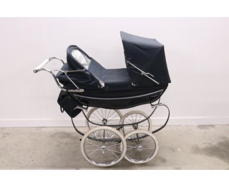 Classic Silver Cross-Style Pram for Babies or Dolls  This exquisite pram embodies the classic Silver Cross-style, replete wit