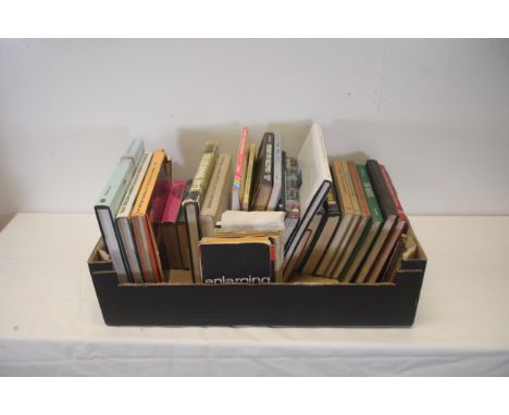 Comprehensive Collection of Photography and Camera Literature  This extensive collection features over thirty books focusing 