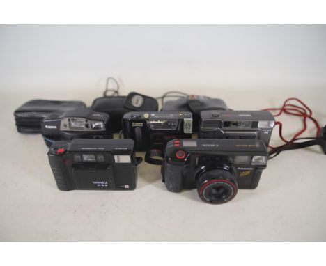 Collection of 5 Compact film cameras  List as follows  Canon sure shot AF-7 Yashica AF-M 2 Panasonic Zoom C-900ZM Miranda AE-