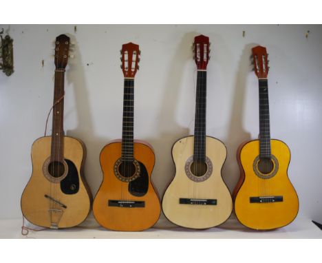 Assorted Collection of Four Acoustic Guitars with Varying Finishes and Conditions  This assortment comprises four acoustic gu