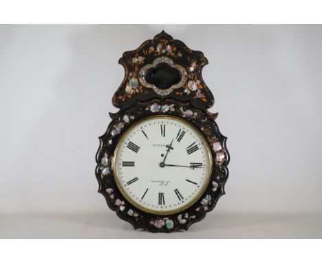 Antique Ornate Clock by J. Travis with Mother of Pearl Inlays This exquisite antique clock, made by the renowned J. Travis, e