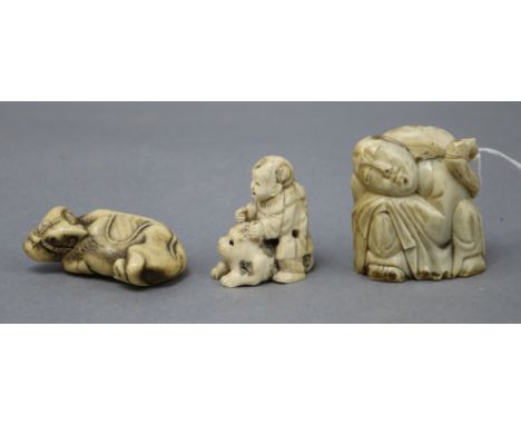A Japanese staghorn buffalo netsuke and two others