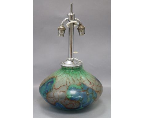 A 1940's art glass lamp base, of squat bulbous form, having opaque marble-effect decoration in blue, green and red and with t