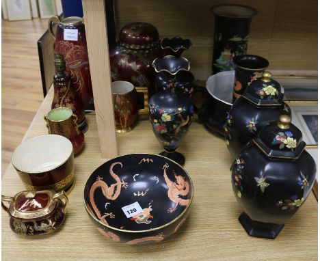 Carlton Ware black ground wares - six vases and a bowl and Carlton Ware red mottled lustre - a Paradise bird & tree ginger ja