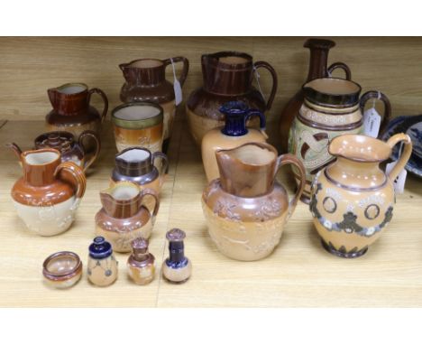 A collection of Doulton Lambeth and Royal Doulton stoneware, including a 'Gladstone' jug (repaired), an 'Egyptian' jug, a 'Br