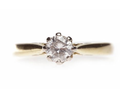 EIGHTEEN CARAT GOLD DIAMOND SOLITAIRE RINGwith an eight claw set round brilliant cut diamond of approximately 0.25 carats, si