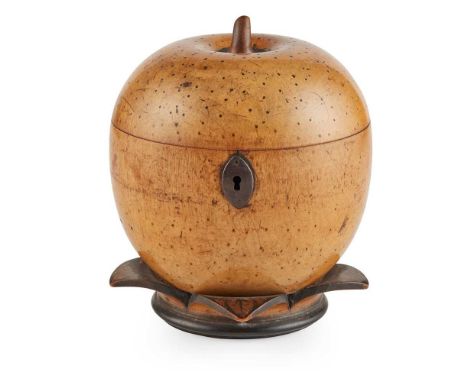 GEORGE III FRUITWOOD MELON-SHAPED TEA CADDY  LATE 18TH CENTURY the hinged cover with a stem over a body dappled with penwork 