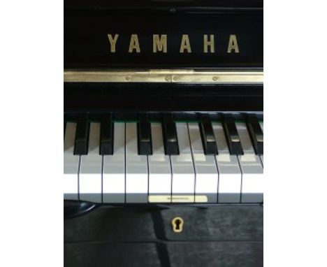 Yamaha (c2006) 
A 4ft 11in Model GB1 grand piano in a bright ebonised case on square tapered legs; together with a matching a