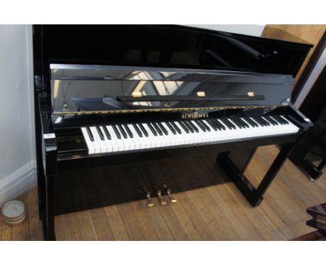 Schimmel (c2001)
A Model 116S Silent Series upright piano in a bright ebonised case.