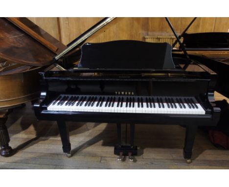 Yamaha (c1975)
A 6ft 1in Model C3 grand piano in an ebonised case on square tapered legs.