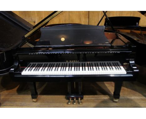 Kawai (c2005)
A 7ft 6in Model RX7 grand piano in a bright ebonised case on square tapered legs. 