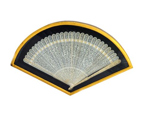 A Canton ivory brisé fan, 19th century, with three oval cartouches detailed with a pagoda against a landscape, the sticks fin